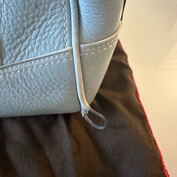 Vintage 2005 blue leather Coach purse
Damage in piping in one area see photo - Picture 2 of 3